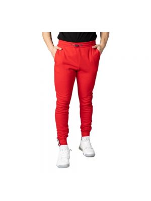 Spodnie sportowe z kieszeniami Tommy Jeans czerwone