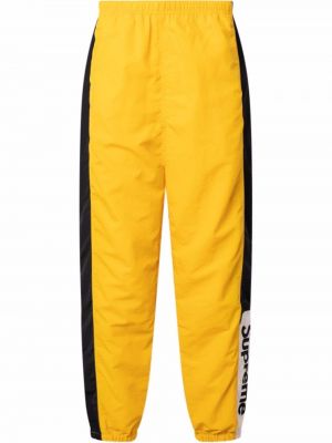 Pantalones de chándal Supreme amarillo
