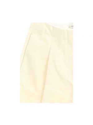 Pantalones rectos Studio Nicholson beige