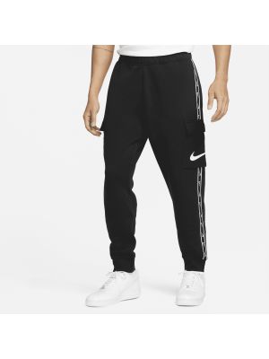 Dzianinowe spodnie sportowe Nike szare
