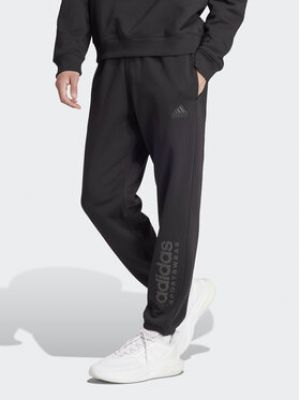 Fleecové sportovní kalhoty Adidas černé