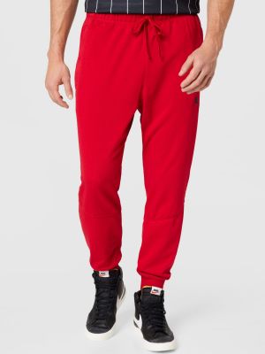 Teplákové nohavice Jordan červená