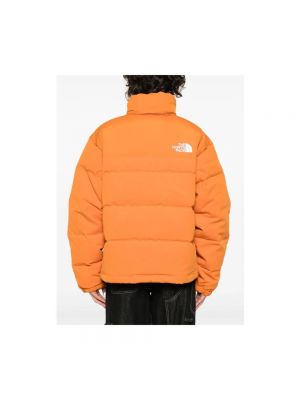 Pikowana kurtka puchowa The North Face pomarańczowa