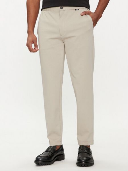 Kalhoty Calvin Klein béžové
