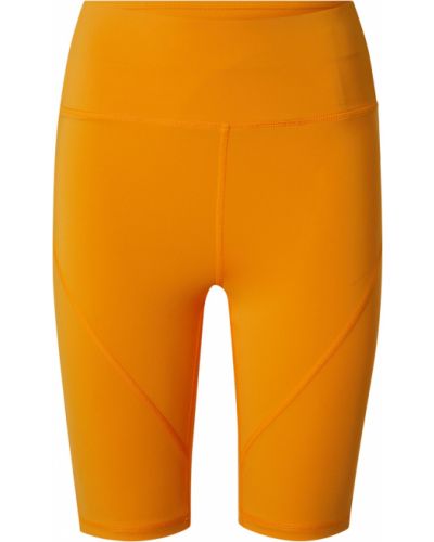 Pantaloni attillati Only Play arancione
