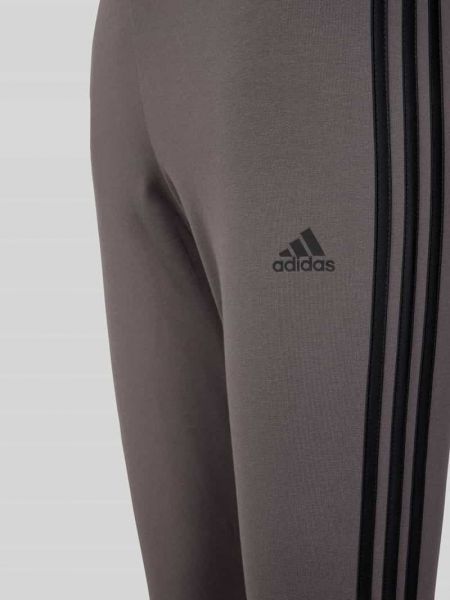 Spodnie sportowe z wysoką talią z nadrukiem Adidas Sportswear szare