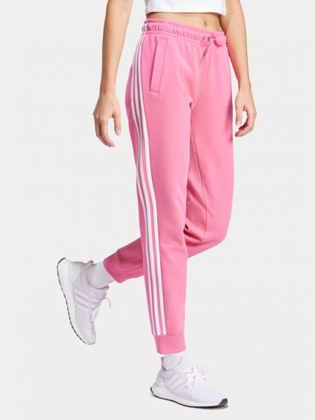 Pruhované sportovní kalhoty Adidas růžové