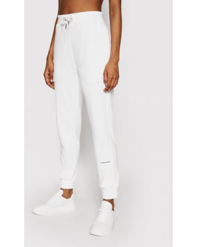 Sportovní kalhoty Calvin Klein Jeans bílé