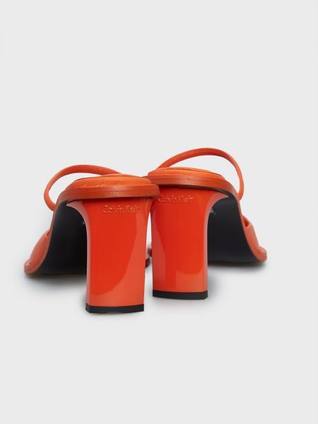 Оранжевые кожаные мюли Calvin Klein