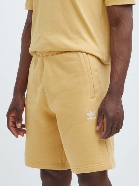 Hlače Adidas Originals rumena