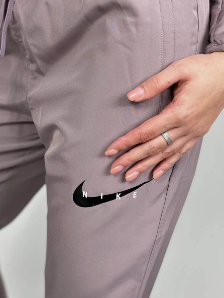 Спортивні брюки для бігу Nike, рожеві