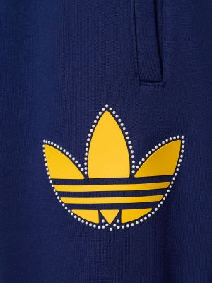 Spodnie sportowe bawełniane Adidas Originals niebieskie