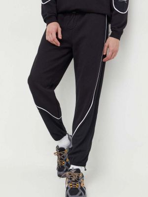 Sportovní kalhoty s aplikacemi Vertere Berlin černé
