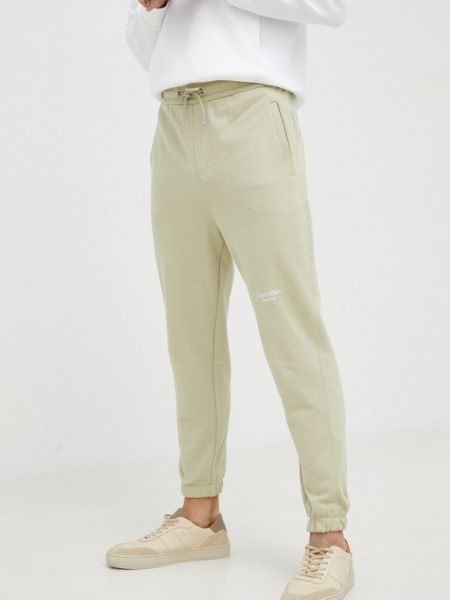 Calvin Klein Jeans pamut melegítőnadrág zöld, férfi, nyomott mintás