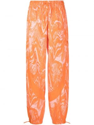 Pantaloni con stampa con motivo a stelle Adidas By Stella Mccartney arancione