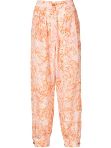 Svilene hlače s potiskom z abstraktnimi vzorci Adriana Degreas oranžna