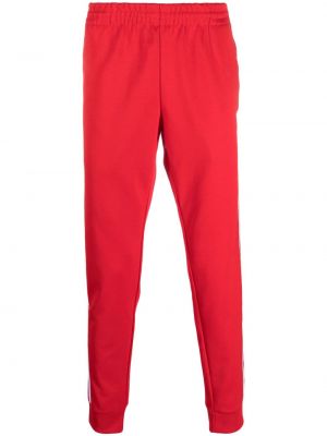 Pantaloni sport cu broderie Adidas roșu
