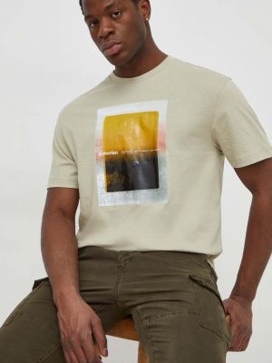 Koszulka bawełniana z nadrukiem Calvin Klein beżowa