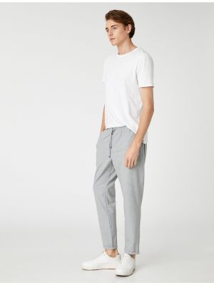 Pletené kalhoty s kapsami Koton šedé