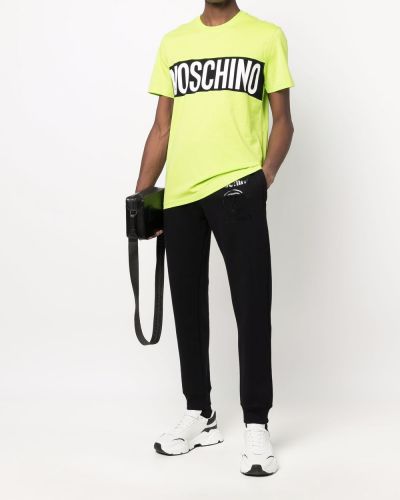 Slim fit sportovní kalhoty s potiskem Moschino černé