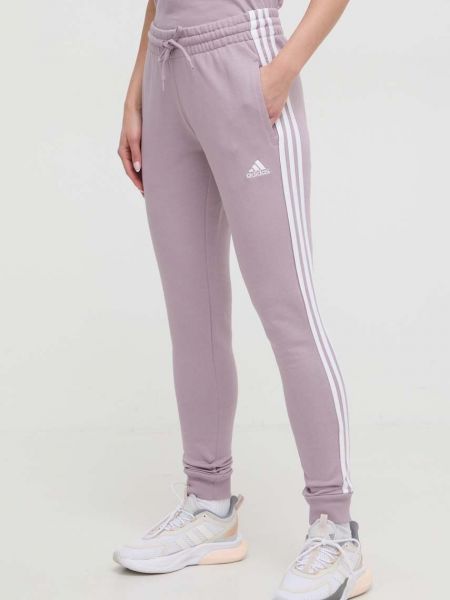 Spodnie sportowe bawełniane w paski Adidas fioletowe