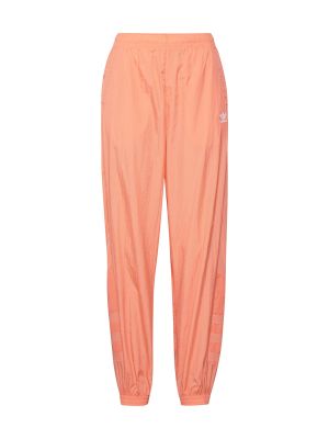 Nohavice Adidas Originals oranžová