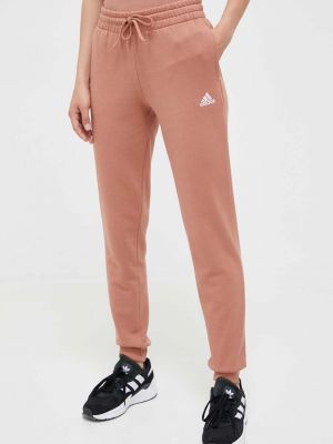 Pantaloni sport din bumbac Adidas portocaliu