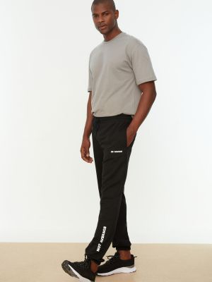 Spodnie sportowe z nadrukiem Trendyol czarne