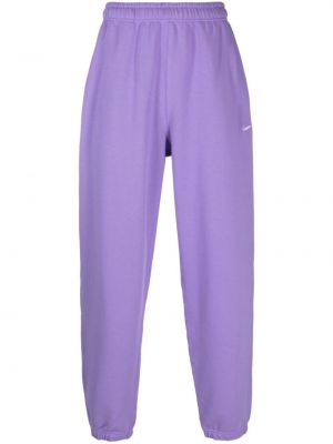 Sportovní kalhoty Nike fialové