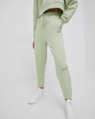 Bavlněné sportovní kalhoty Ellesse - zelená