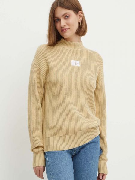 Długi sweter bawełniany Calvin Klein Jeans beżowy