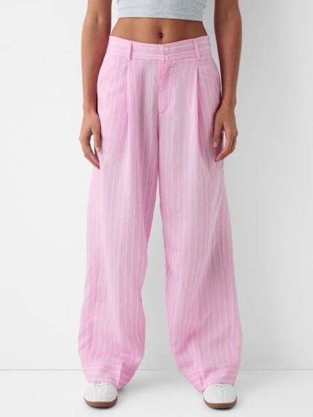 Spodnie relaxed fit Bershka różowe