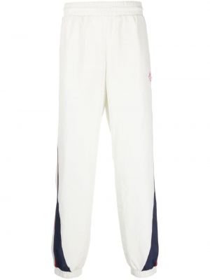 Pruhované teplákové nohavice Casablanca biela