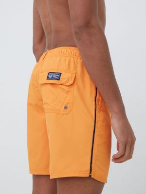 Pantaloni Superdry portocaliu