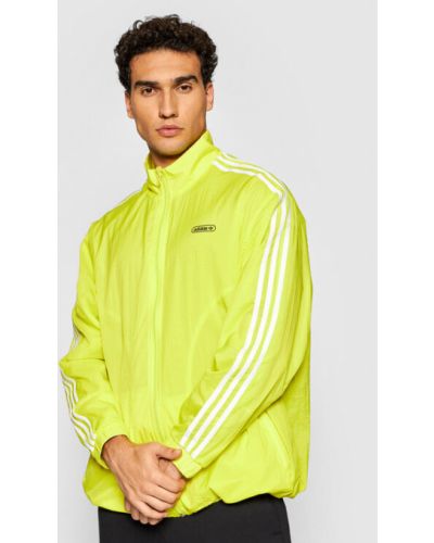 Priliehavá prechodná bunda Adidas žltá