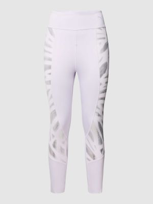 Spodnie sportowe z nadrukiem Puma fioletowe