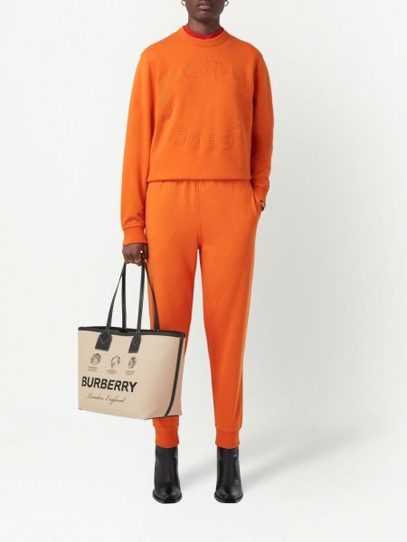 Spodnie sportowe bawełniane Burberry pomarańczowe