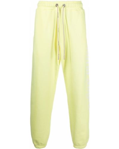 Pantaloni con stampa Palm Angels giallo