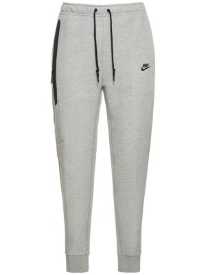 Fleecové běžecké kalhoty Nike šedé