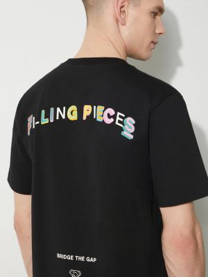 Бавовняна футболка з принтом Filling Pieces чорна