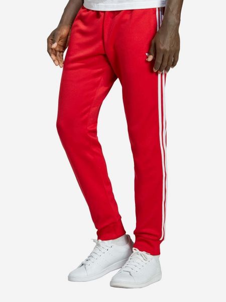 Spodnie sportowe z nadrukiem Adidas Originals czerwone