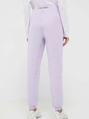 Kalhoty Calvin Klein Performance fialové