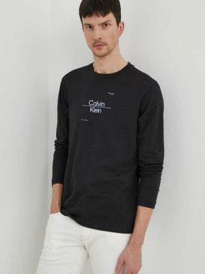 Bavlněné tričko s dlouhým rukávem s potiskem s dlouhými rukávy Calvin Klein černé