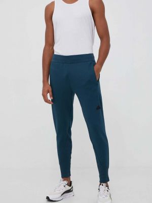 Sportovní kalhoty Adidas modré