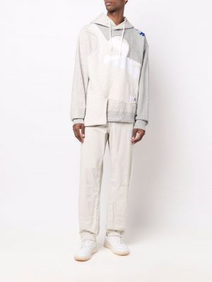 Proste spodnie w paski Maison Mihara Yasuhiro białe