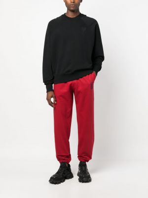 Bavlněné sportovní kalhoty s výšivkou Paccbet červené