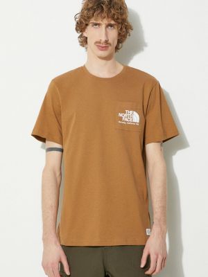 Koszulka bawełniana z nadrukiem z kieszeniami The North Face brązowa