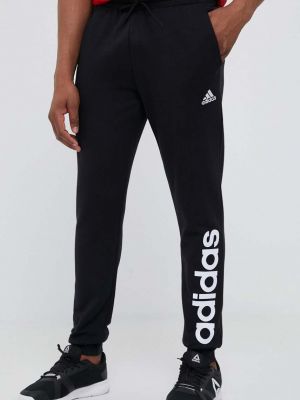 Памучни панталон с принт Adidas черно