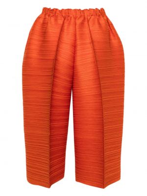 Spodnie plisowane Pleats Please Issey Miyake pomarańczowe