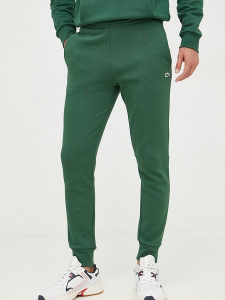 Однотонные спортивные штаны Lacoste зеленые